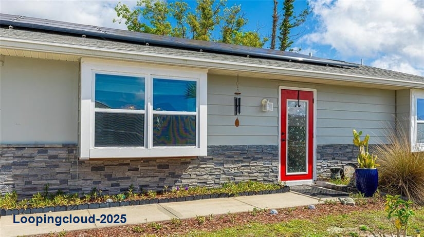 Remodeled Single Family Home with Backyard Oasis & Solar Power in Gardens of Gulf Cove!