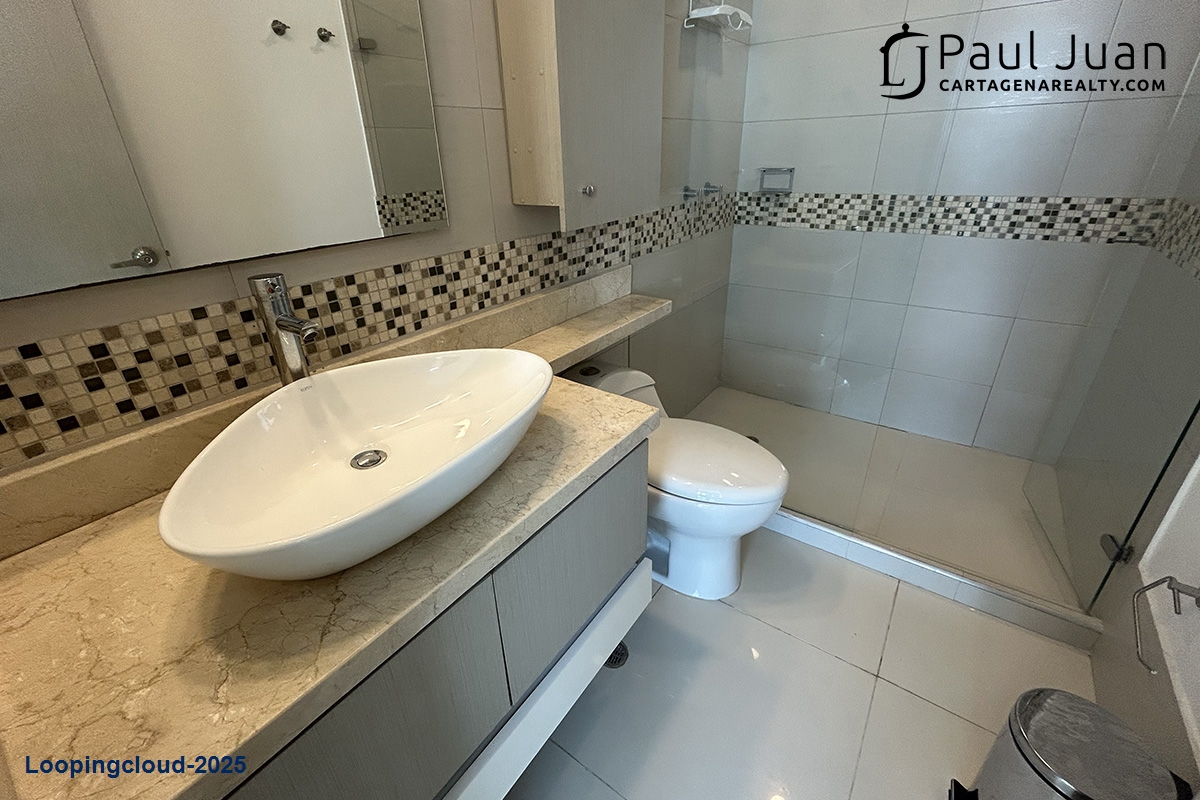 Turn-Key One Bedroom Beachfront Apartment with Spectacular Views for Sale