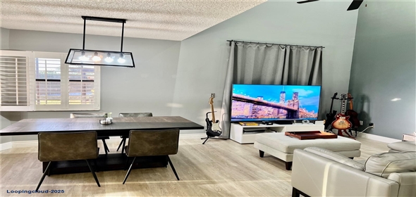 1018 SW 113th Ter # 117 Pembroke Pines Florida, 33025 | Canal-View Townhouse with Wraparound Patio & Garage