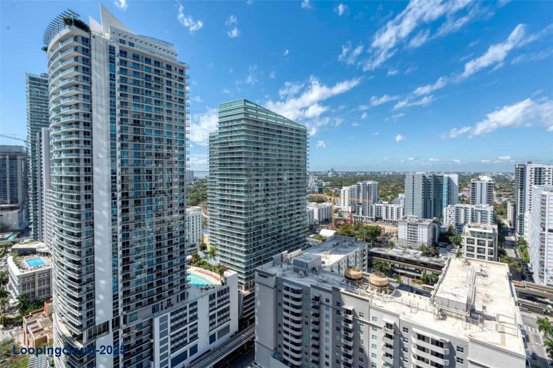 Elegant Corner Unit with Designer Finishes and Spectacular Views