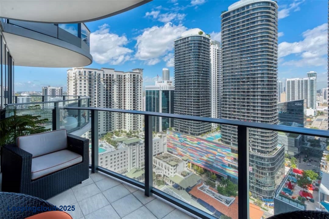 Elegant Corner Unit with Designer Finishes and Spectacular Views