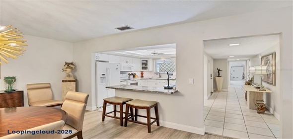 3941 GLEN OAKS DRIVE E #32 Sarasota Florida, 34232 | Exclusive Lakeview Home