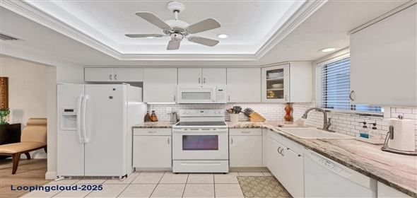 3941 GLEN OAKS DRIVE E #32 Sarasota Florida, 34232 | Exclusive Lakeview Home