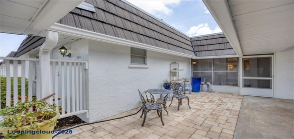 3941 GLEN OAKS DRIVE E #32 Sarasota Florida, 34232 | Exclusive Lakeview Home