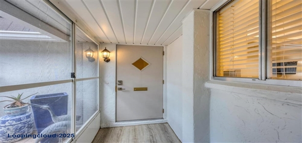 3941 GLEN OAKS DRIVE E #32 Sarasota Florida, 34232 | Exclusive Lakeview Home