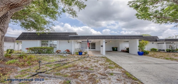 3941 GLEN OAKS DRIVE E #32 Sarasota Florida, 34232 | Exclusive Lakeview Home