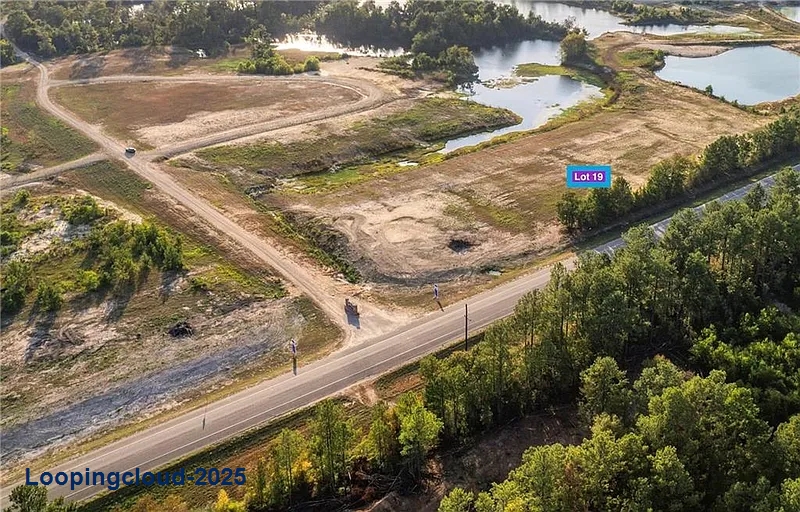 Oversized Lot with Hwy-16 Frontage + River Access