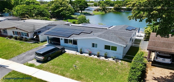 728 SW 4th StHallandale Beach, FL 33009 Hallandale Beach Florida, 33009 | Your Lakeside Dream Awaits: Remodeled, Solar, & Incredible