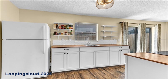 1631 LITTLE FALLS CIR # 92 Orlando Florida, 32807 | Completely Remodeled Home