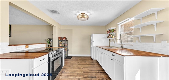 1631 LITTLE FALLS CIR # 92 Orlando Florida, 32807 | Completely Remodeled Home