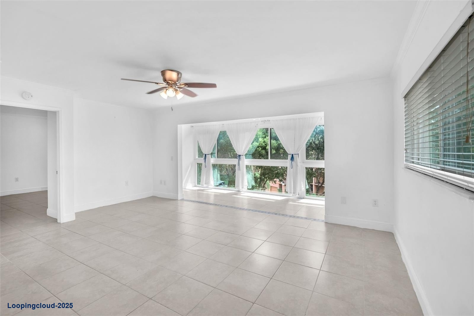 Spacious 2-Bed/2-Bath Corner Condo with Enclosed Balcony Views