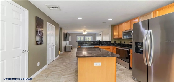 8614 MAJESTIC ELM CT Bradenton Florida, 34202 | Modern 3-Story Townhome with Pond Views & Designer Upgrades