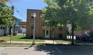408 Ann Street East Lansing Michigan, 48823 | 408 Ann Street | 11-Unit Stabilized MSU Student Housing Asset