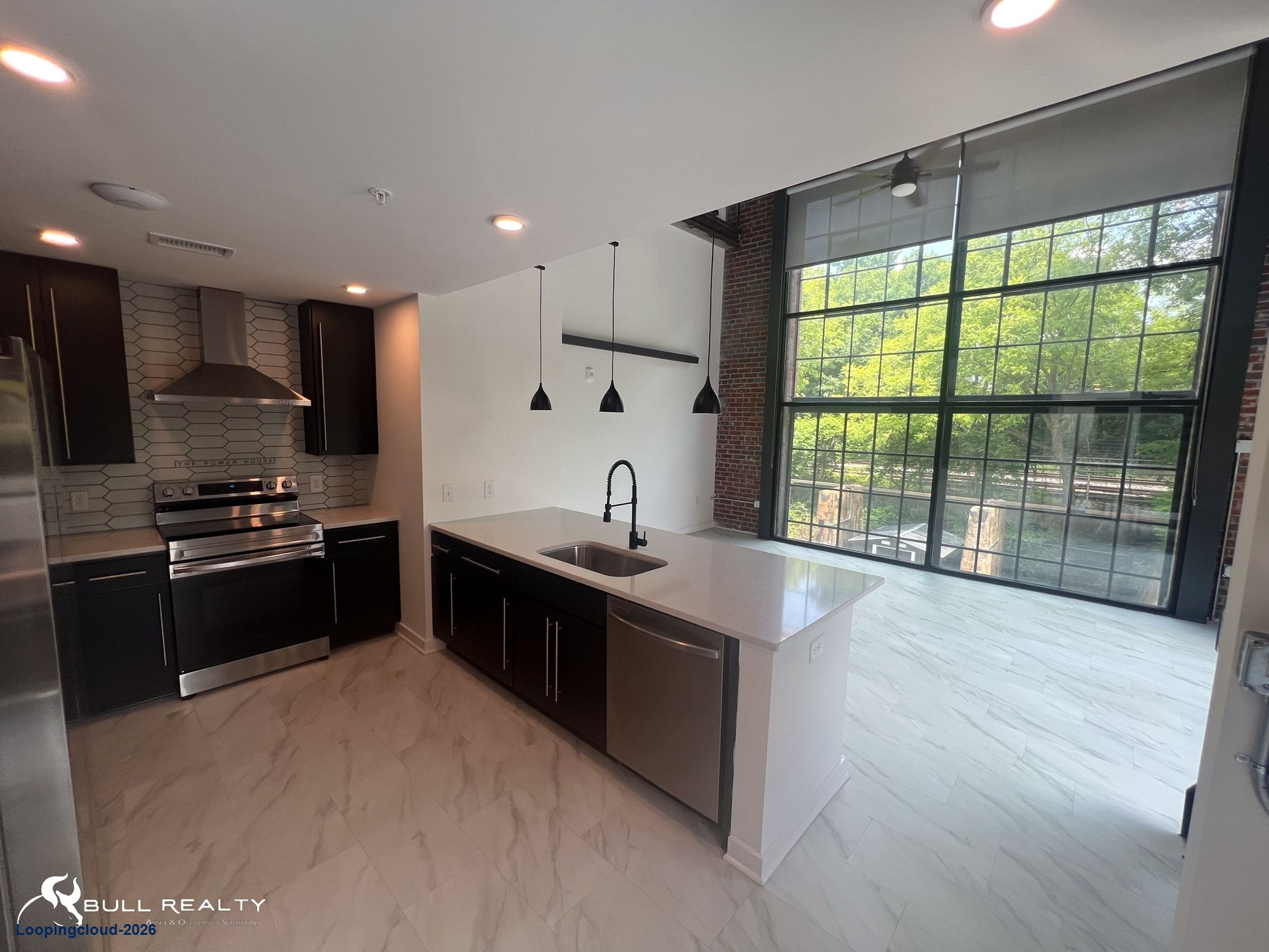 The Power House | Award Winning Adaptive Reuse | 37 Luxury Residential Lofts + Retail