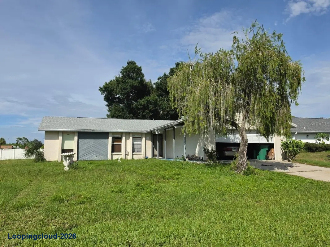 Single family home for sale at 586 ALTOONA ST NW Port Charlotte, FL 33948