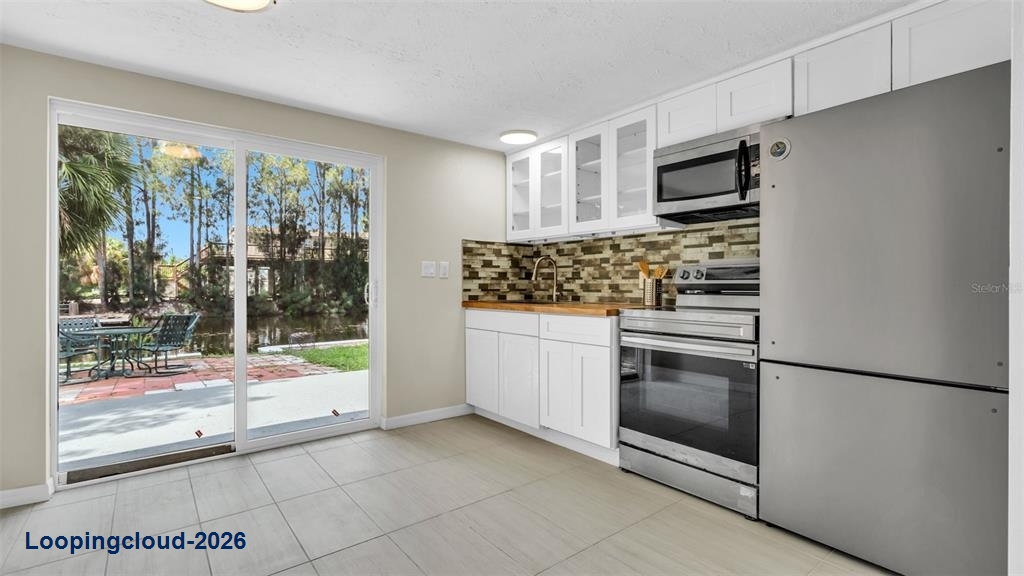 14832 Atlantic Ave, Hudson, FL 34667 | Canal-Front Home w/ Gulf Access