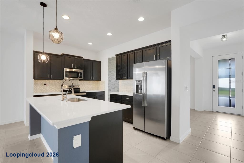 935 Benjamin Trl, Davenport, FL 33837 | Low-Maintenance Home w/ Hot Tub