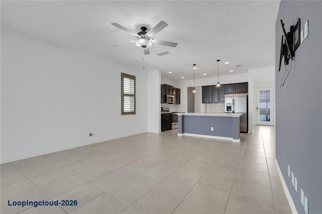 935 Benjamin Trl, Davenport, FL 33837 | Low-Maintenance Home w/ Hot Tub