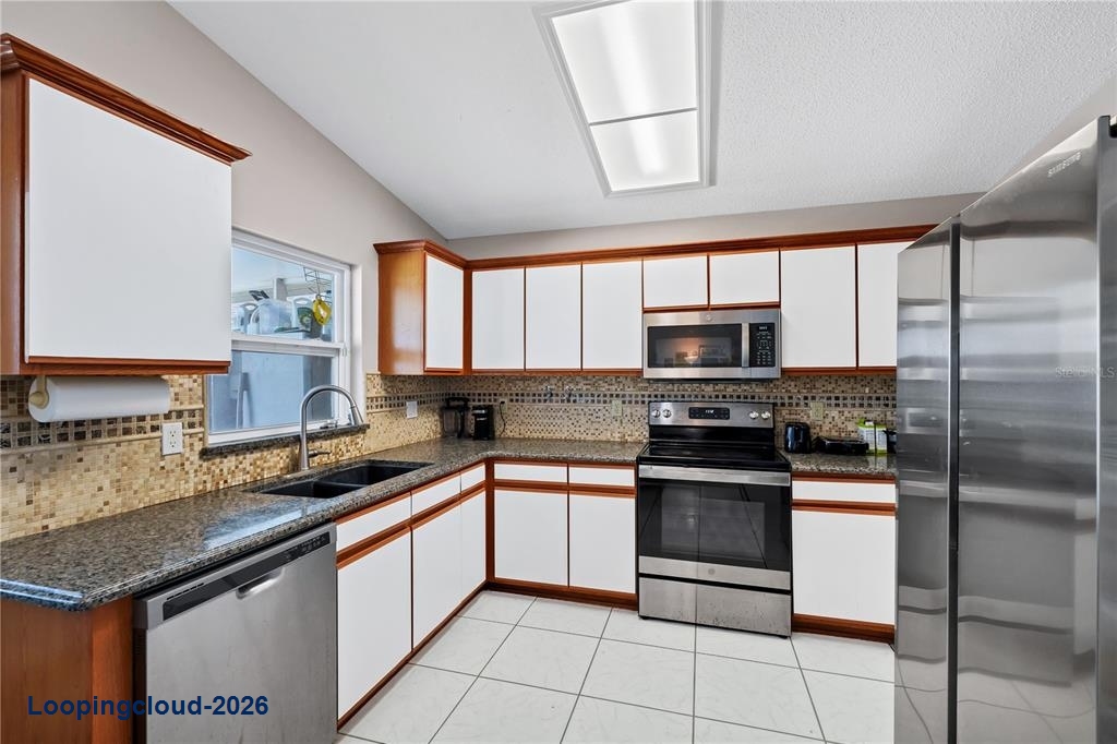 2619 Heron Landing Ct, Orlando, FL 32837 | Waterfront Pool Home in Hunter
