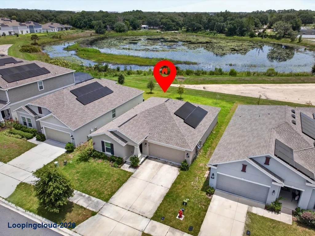 Modern Waterfront Home with Solar Panels in Astonia North | Davenport, FL
