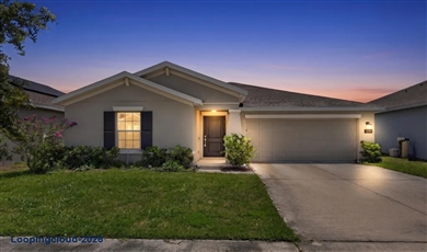 Modern Waterfront Home with Solar Panels in Astonia North | Davenport, FL