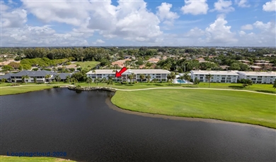 Resort-Style Living in Atlantis, Florida | 2 Bed, 2 Bath Waterfront Condo with Golf Views